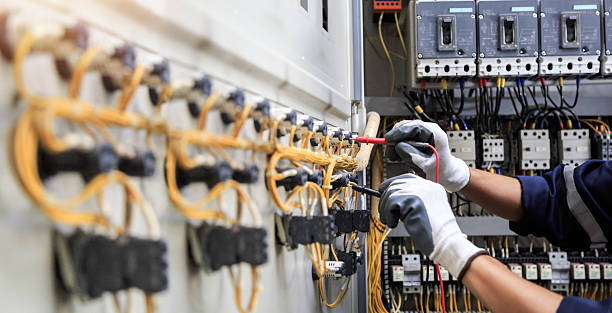 Professional Electrician technician working in Fairview Shores, FL
